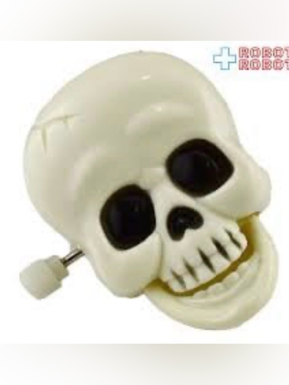 Vintage Hallmark WindUp Chattering Skull Pin 1985